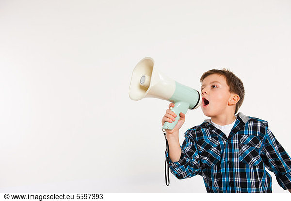 Boy shouting through megaphone