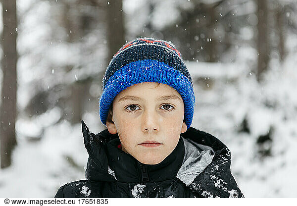 Boy wearing knit hat in winter