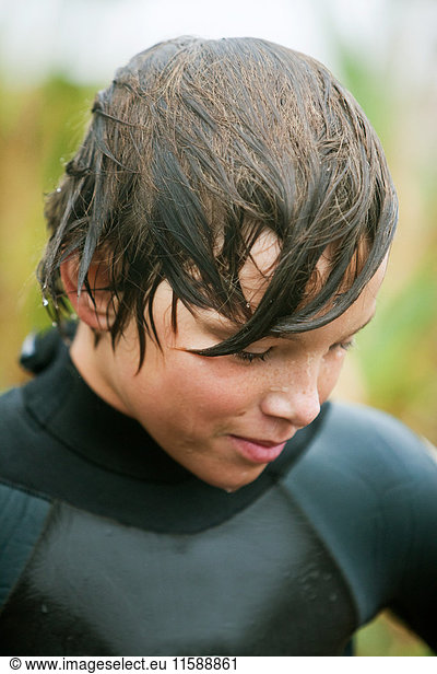 Boy wearing wetsuit