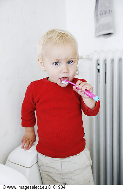 Boy with toothbrush