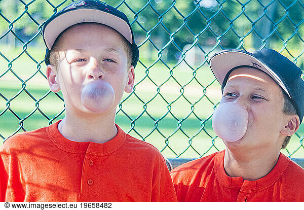 BOYS in the dugout fooling AROUND