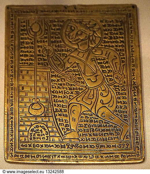 Brass talisman plaque  Egyptian 12th-15th century AD.