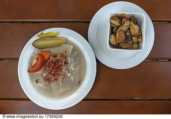 Brawn served with fried potatoes in a beer garden  Bavaria  Germany  Europe