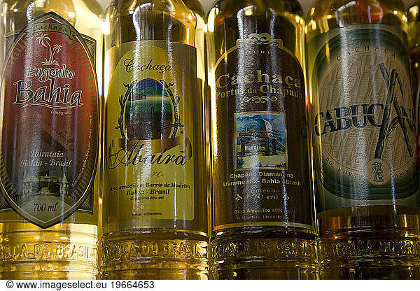 BraziL. Bottles of locally made Cachaca on sale at the indoor market
