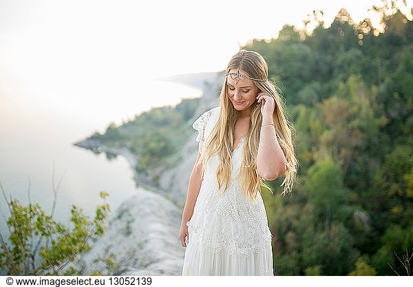 Bride on clifftop by coast  Scarborough Bluffs  Toronto  Canada