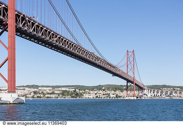 Bridge across river  April 25th Bridge  River Tagus  Lisbon  Portugal