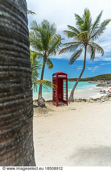 British phone box in front of Caribbean Sea  Dickenson Bay  Antigua