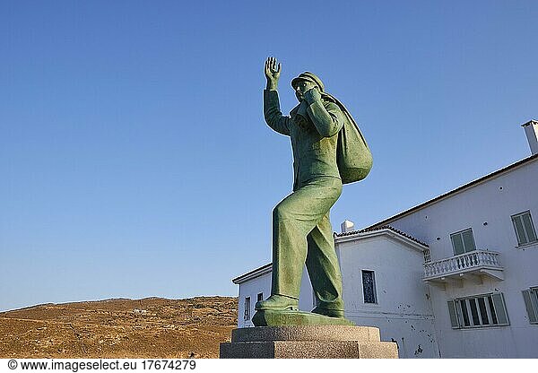 Bronze statue  waving sailor  blue cloudless sky  Chora  Andros Town  Andros Island  Cyclades  Greece  Europe
