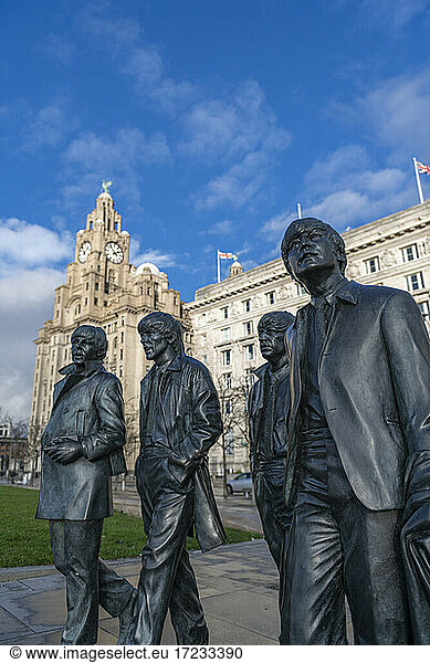 Bronze statues of the Beatles stand on Liverpool Waterfront  Liverpool  Merseyside  England  United Kingdom  Europe
