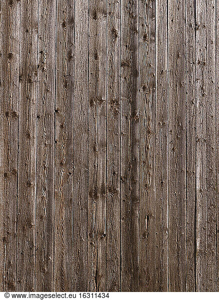 Brown boards of a wooden wall