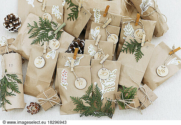 Brown paper bags with numbers kept on carpet