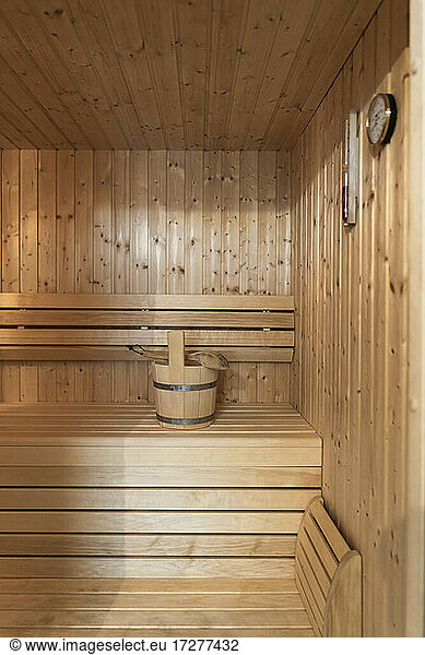 Bucket on seat in sauna