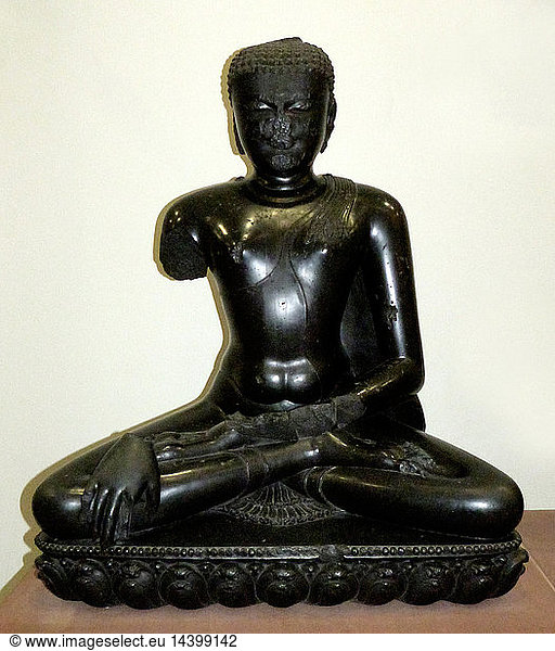 Buddha Shakyamuni (circa 1100-50) Basalt  Eastern India. The historical Buddha was called Shakyamuni (Sage of the Shakya clan.) He abandoned his princely life to seek a way to escape the cycle of death and rebirth. Here he is shown just before his enlightenment. Seated in meditation  he calls the earth to witness his successful resistance to the temptations of the evil god Mara. After achieving enlightenment and teaching his new way  he entered nirvana.