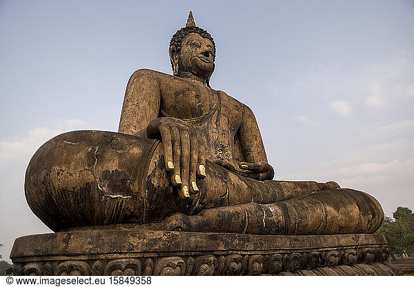 Buddha statue at Wat Mahatat temple   Sukhothai Historical Park  Sukhothai  Thailand.