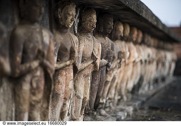 Buddhist stone carvings at the Wat Mahatat temple   Sukhothai Historical Park  Sukhothai  Thailand.