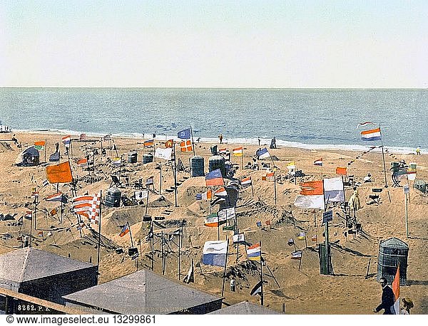 Building sand castles on the beach 1895