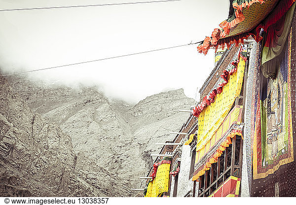 Building with traditional decoration against mountain