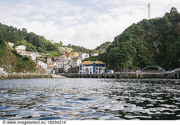 Buildings and mountain at coast of Cudillero  Asturias  Spain