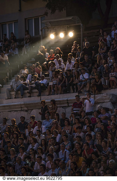 Bulgaria  concert audience sitting at spotlight