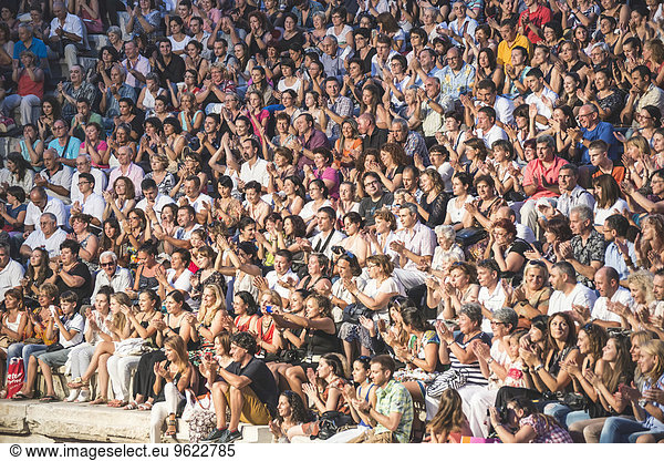 Bulgaria  excited concert audience clapping hands