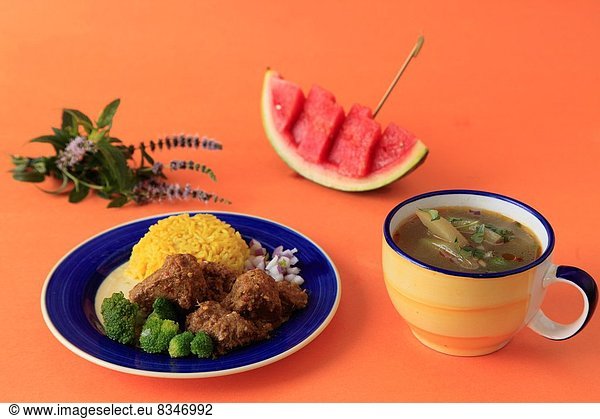 Burmese meal  tamarind pork curry  christophine soup .