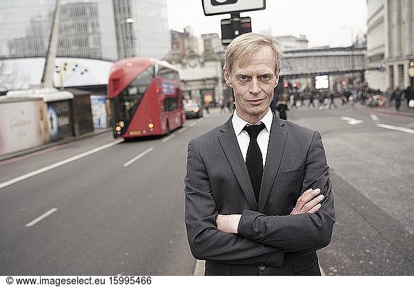 Business man at street in London  UK.