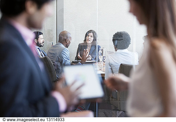 Business people discussing at office