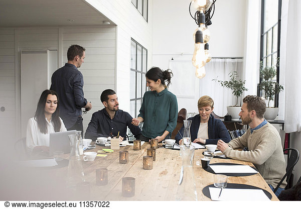 Business people during meeting at table in office