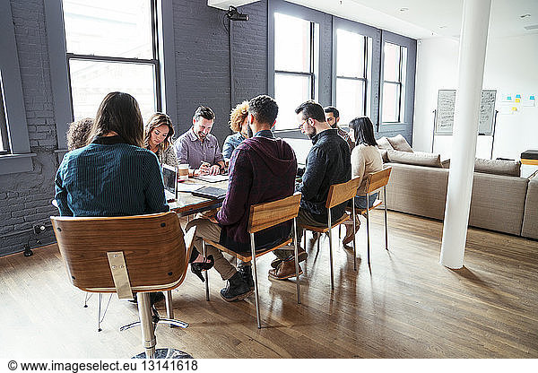 Business people planning at table in office