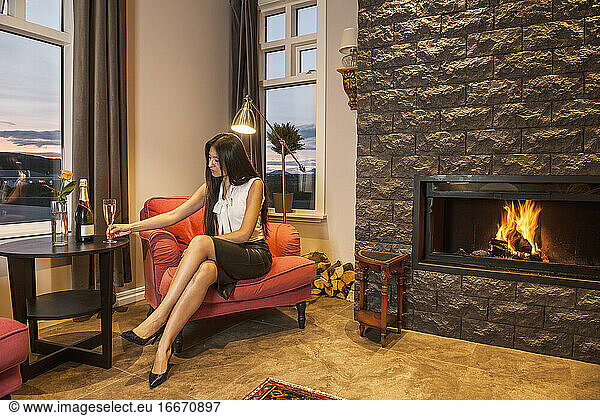 business woman relaxing at hotel lounge in Iceland