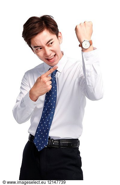 Business young man wearing a wrist watch