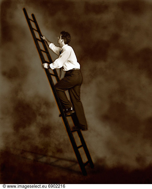 Businessman Climbing Ladder