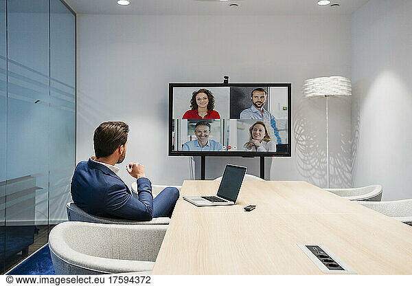 Businessman discussing in web conference at meeting room