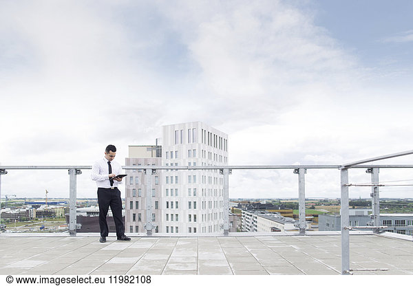 Businessman on rooftop