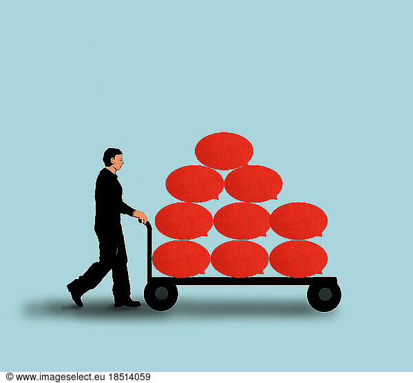 Businessman pushing blank red speech bubbles on trolley