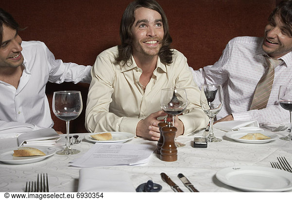 Businessmen at Restaurant Table