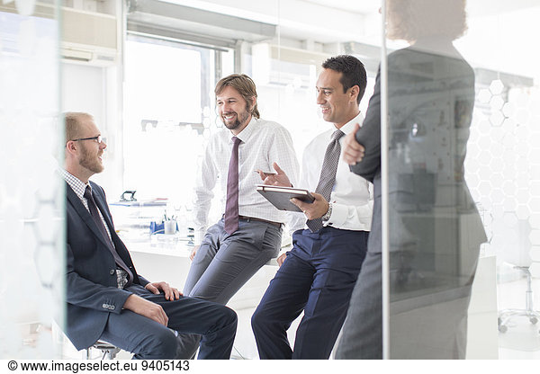 Businesspeople having meeting in modern office