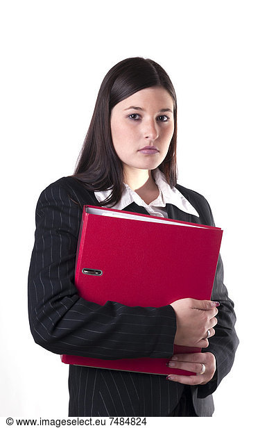 Businesswoman holding a red folder in her arm
