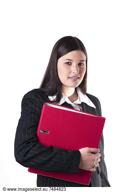 Businesswoman holding a red folder in her arm  smiling