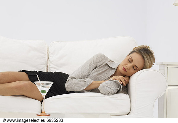 Businesswoman Sleeping on Sofa