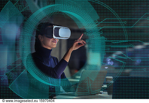 Businesswoman using virtual reality glasses