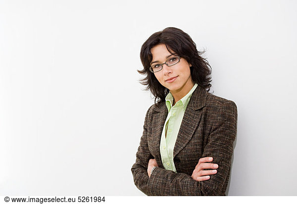 Businesswoman with arms crossed  portrait