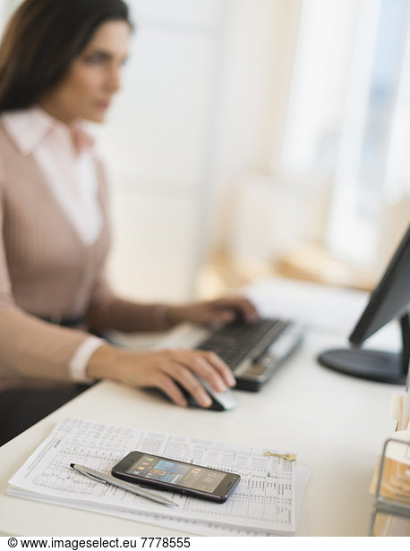 Businesswoman working on computer