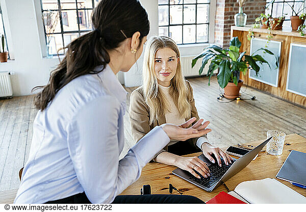 Businesswomen discussing at home office