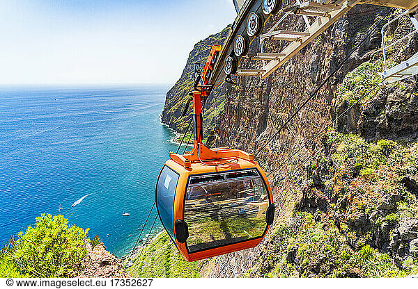 Cable car descending the steep ravine down to the sea  Camara de Lobos  Madeira island  Portugal  Atlantic  Europe