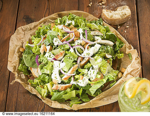 Caesar salad with cool drink  close up