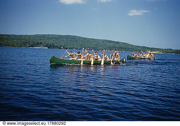 Camp Boys rowing Canoes  Camp Sunapee  New Hampshire  USA  Toni Frissell Collection  July 1955
