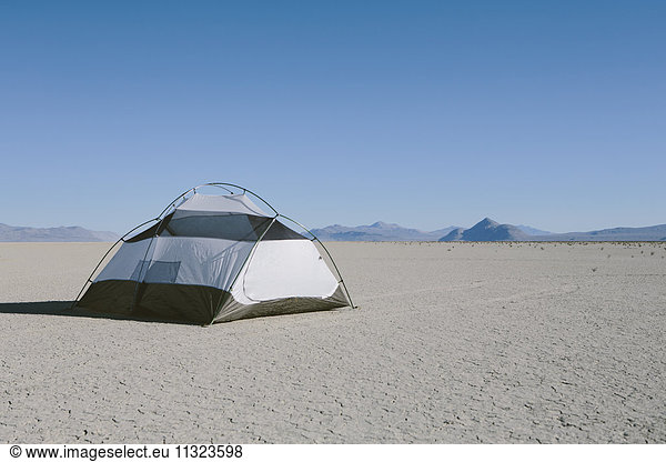 Camping tent on vast playa  Black Rock Desert  Nevada