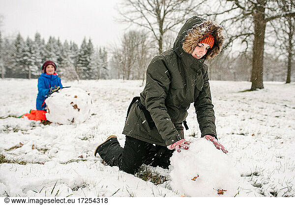 Canada  Ontario  Mother and son playing in snow