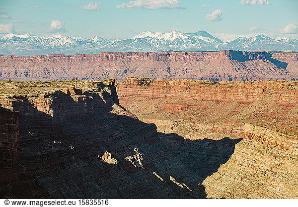 canyonlands utah canyon shadows with la sal mountains in background